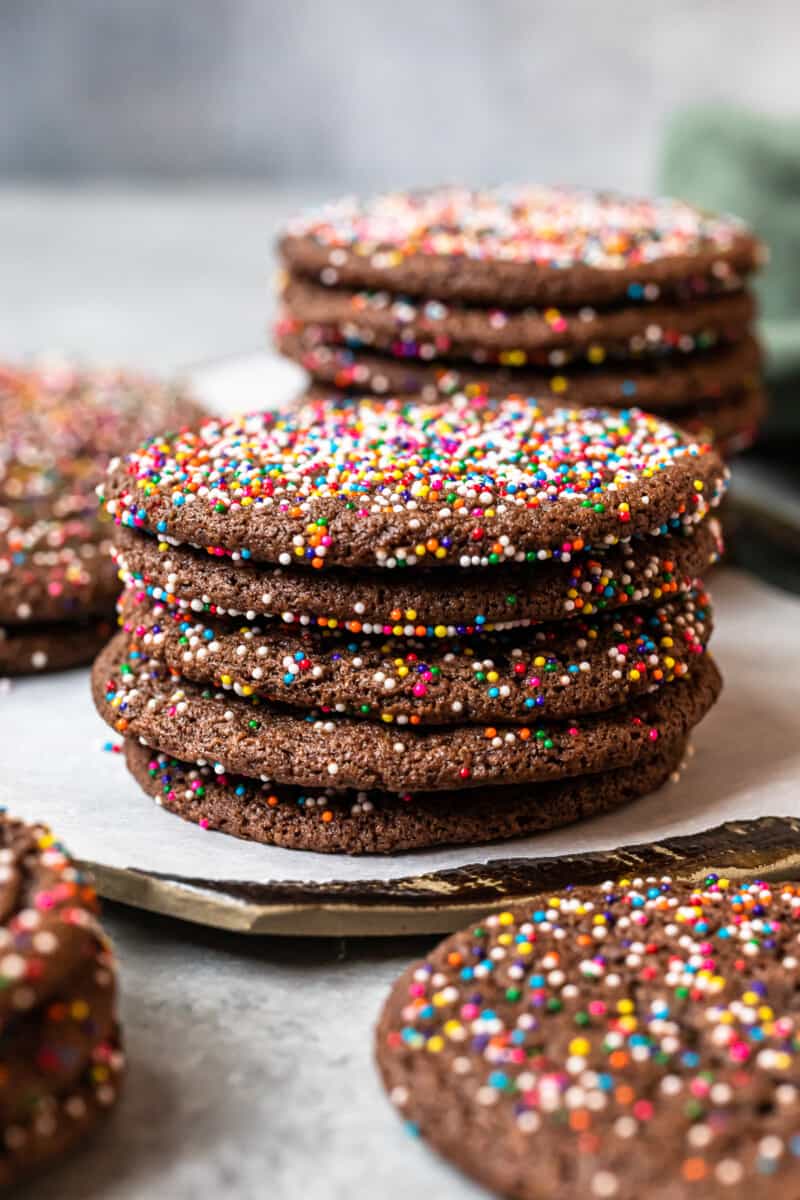 stack of 5 chocolate butter cookies on a white plate