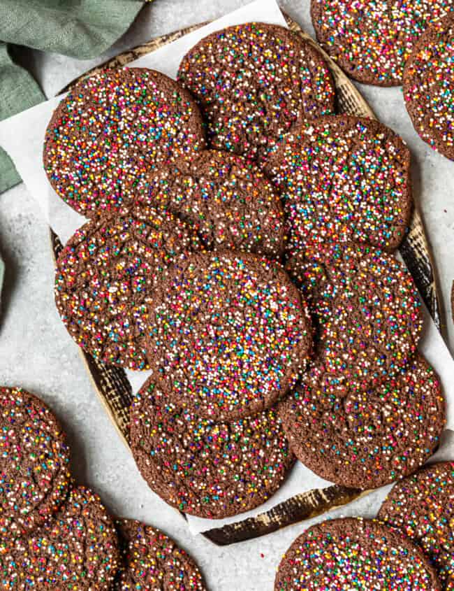 chocolate butter cookies with sprinkles on a baking sheet