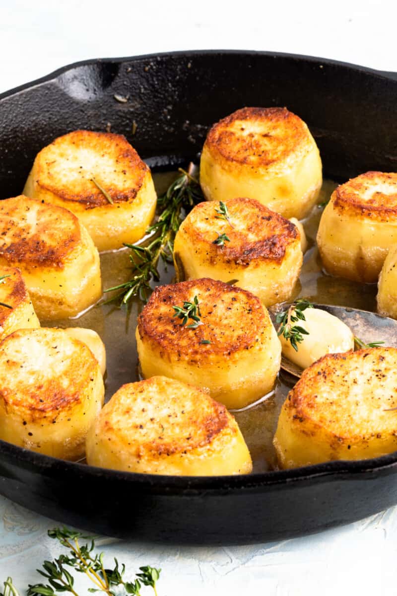 fondant potatoes in a skillet