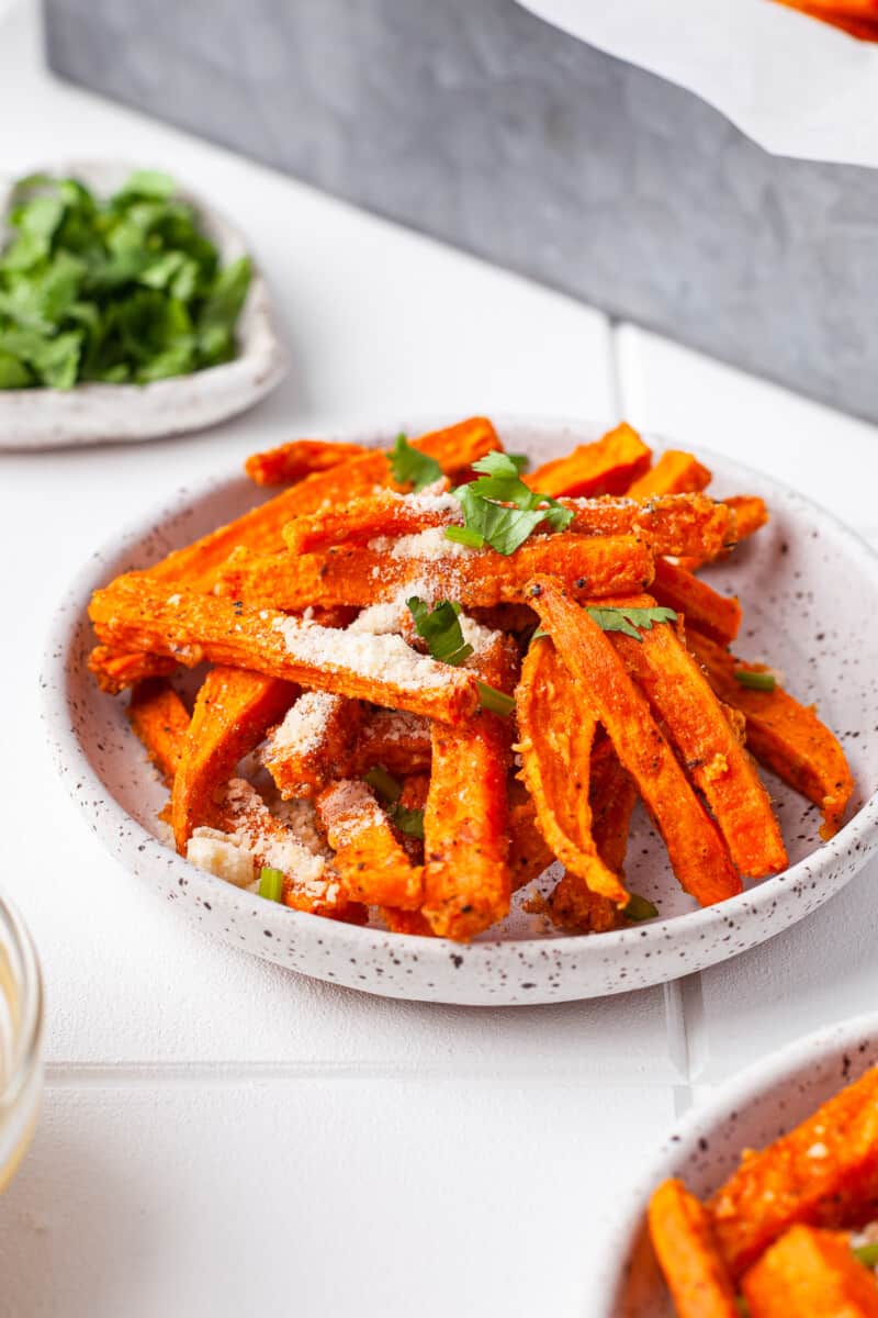 plate with garlic parmesan sweet potato fries