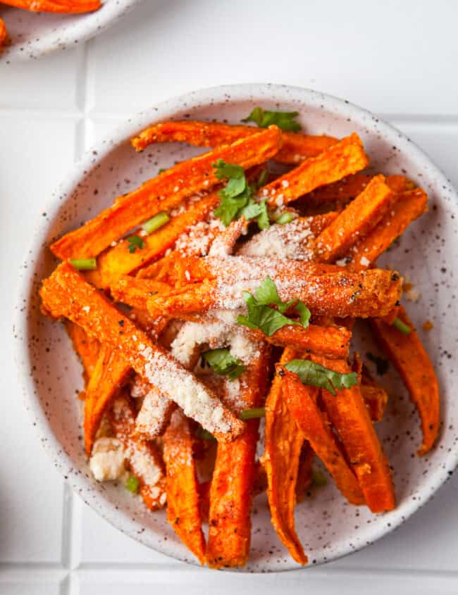 plate with garlic parmesan sweet potato fries