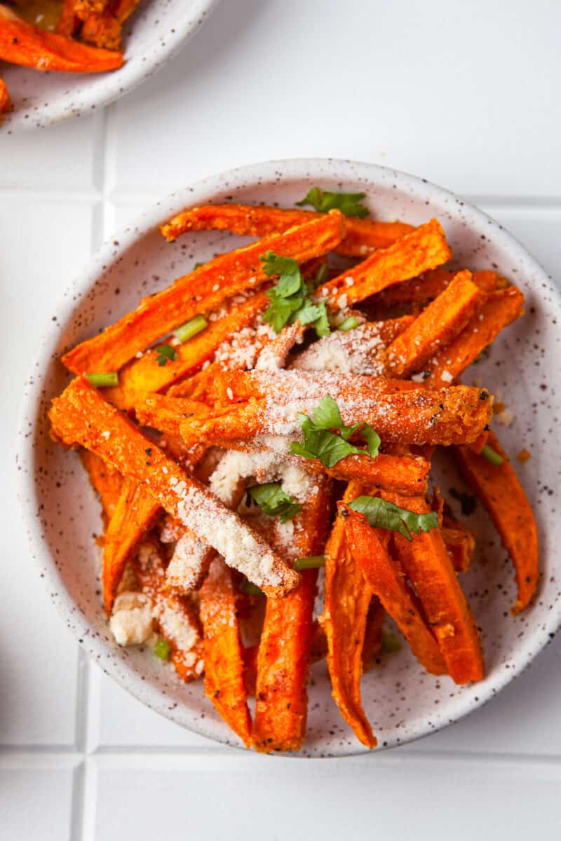 plate with garlic parmesan sweet potato fries