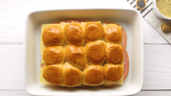 ham and cheese sliders in a baking dish
