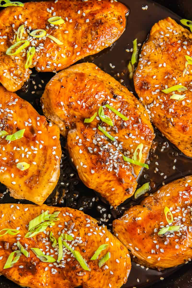 honey garlic chicken breasts in a skillet