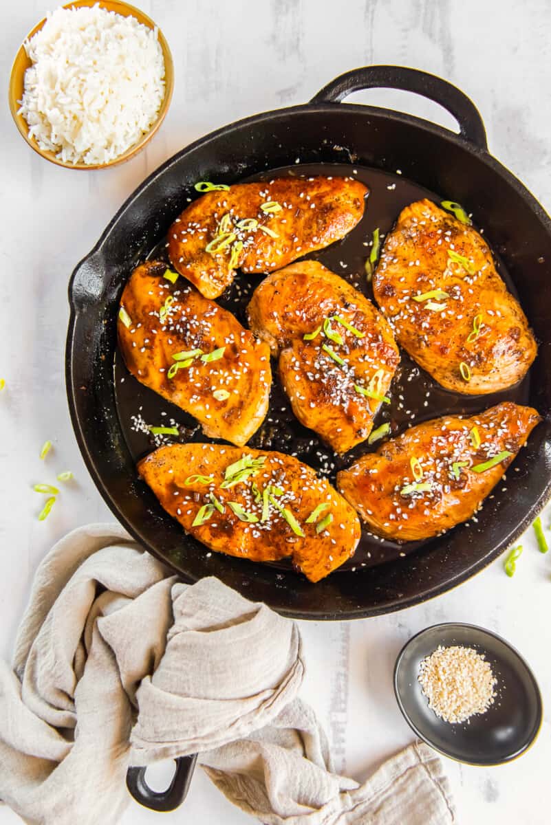 honey garlic chicken breasts in a skillet