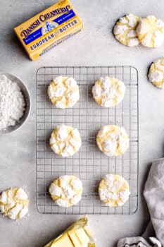 gooey butter cookies on a cooling rack