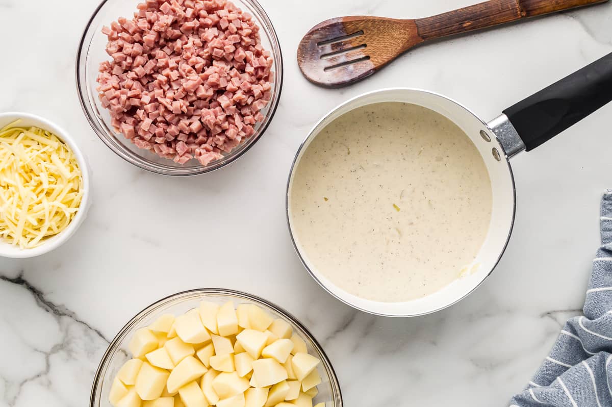 cream sauce for ham and potato casserole in a saucepan