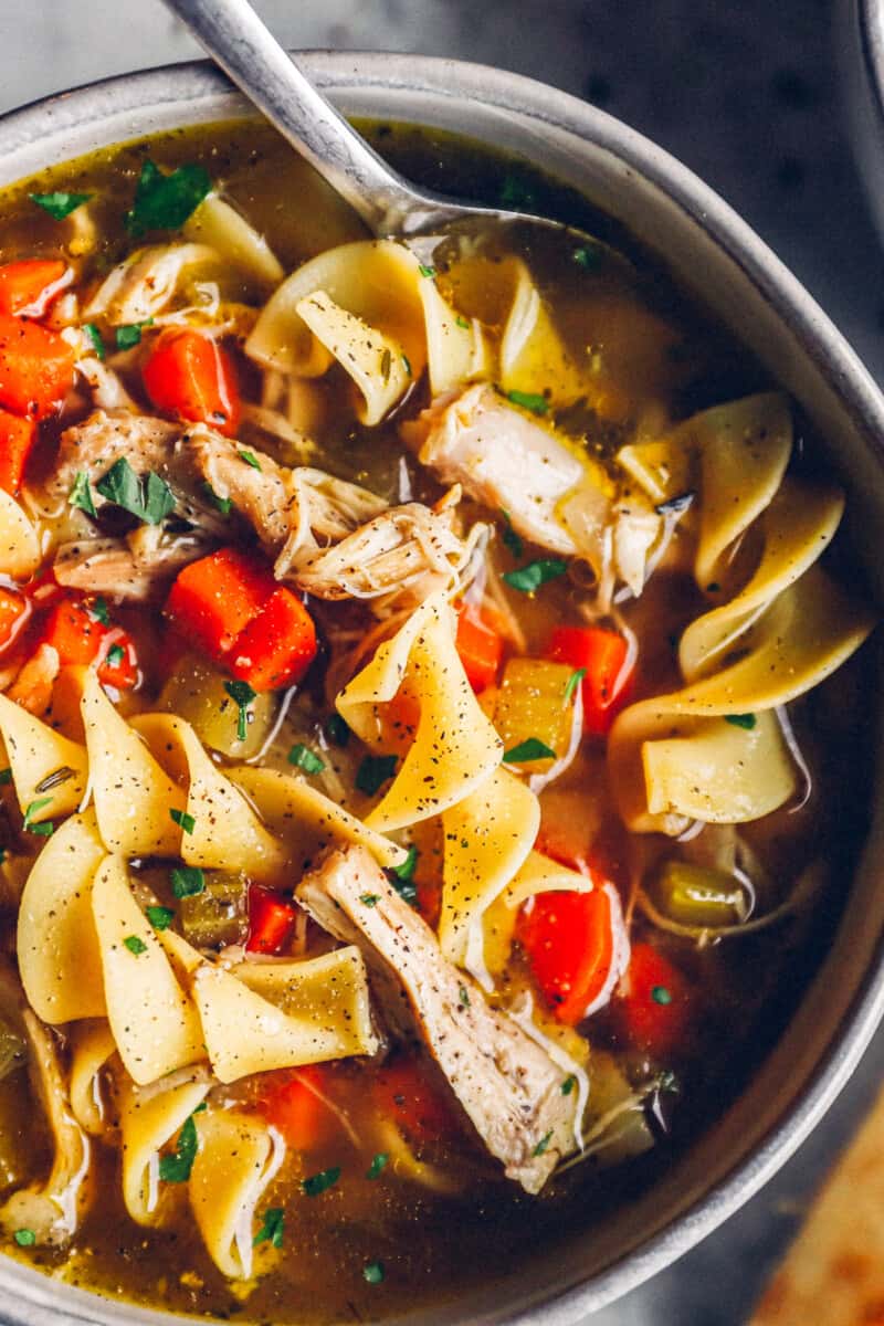 up close gray bowl of instant pot chicken noodle soup