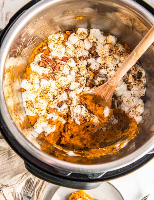 sweet potato casserole in instant pot with wood spoon