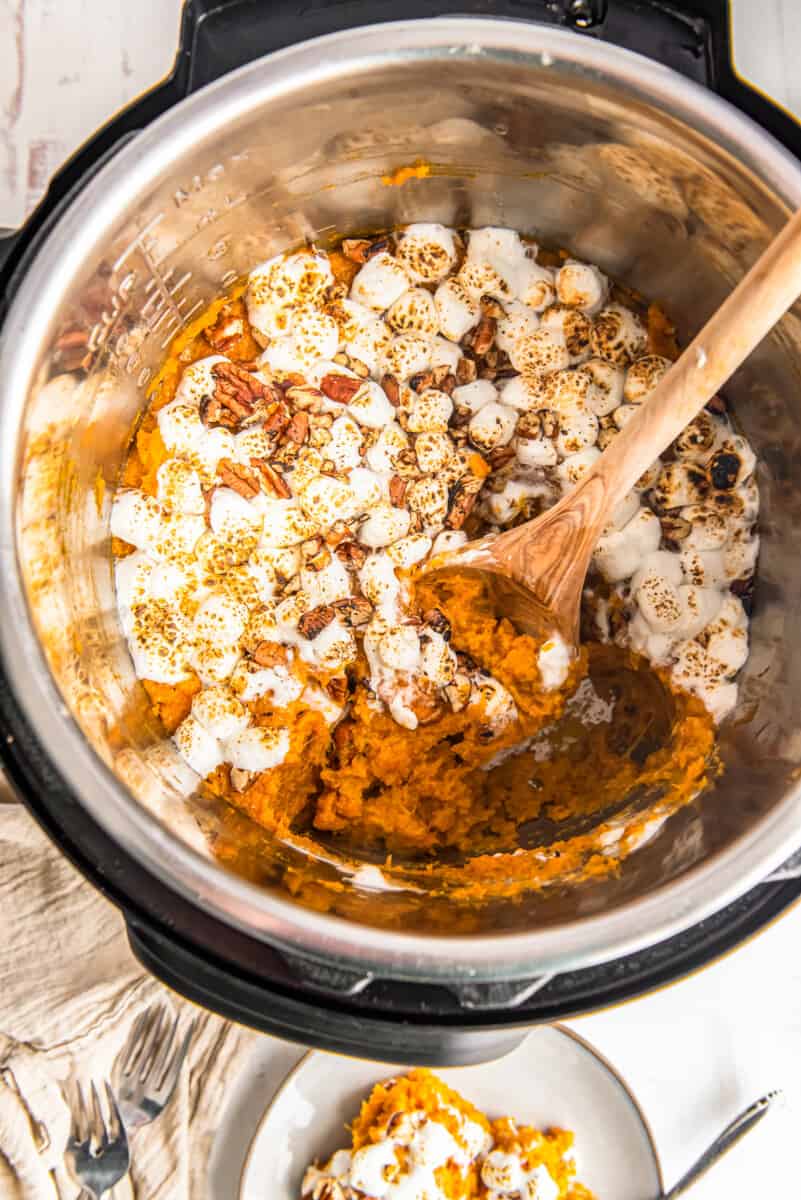 sweet potato casserole in instant pot with wood spoon