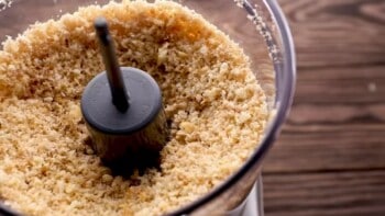 cracker and bread crumb mix in a food processor