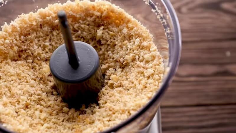 cracker and bread crumb mix in a food processor