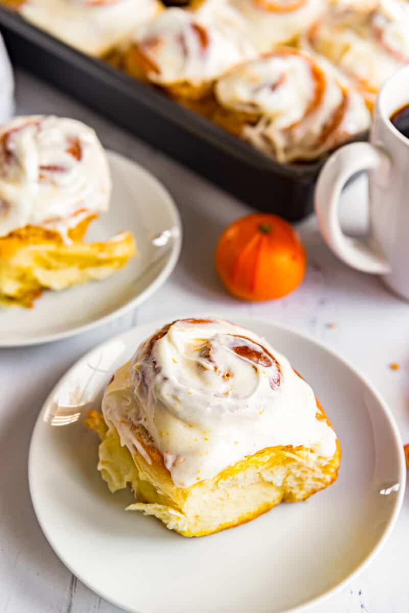 frosted orange roll on plate