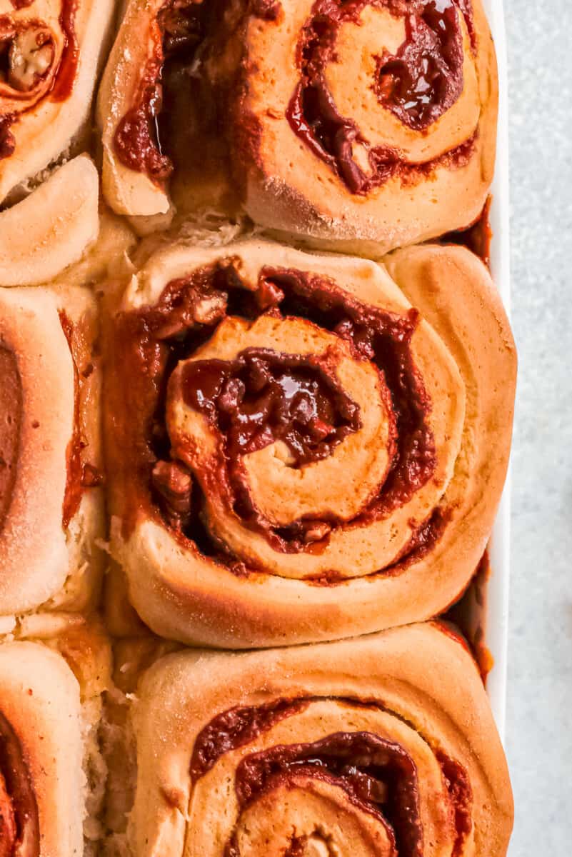 up close pecan caramel roll in baking dish