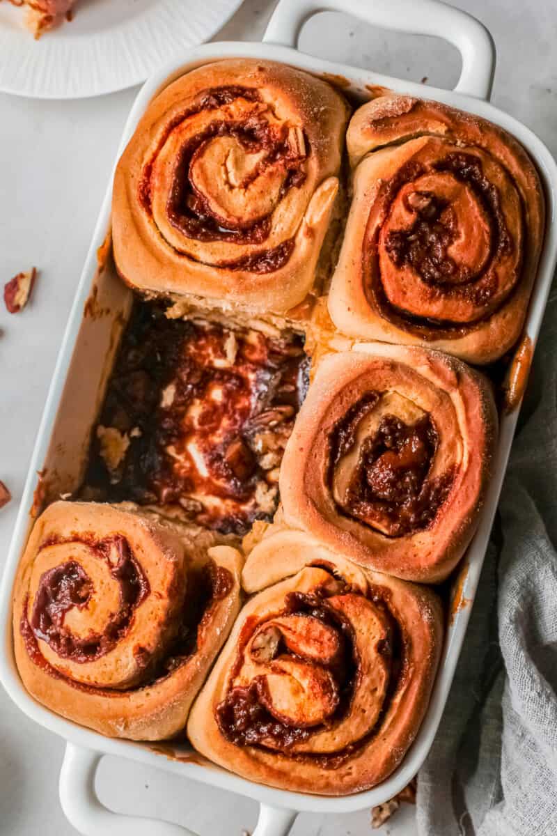 baking dish with pecan caramel rolls