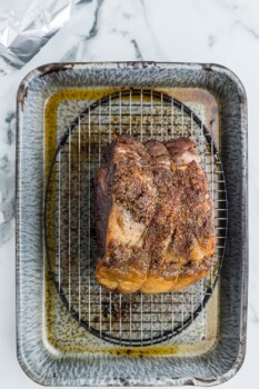 cooked prime rib roast in a baking pan