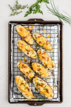 8 twice baked potatoes after baking on a cooling rack