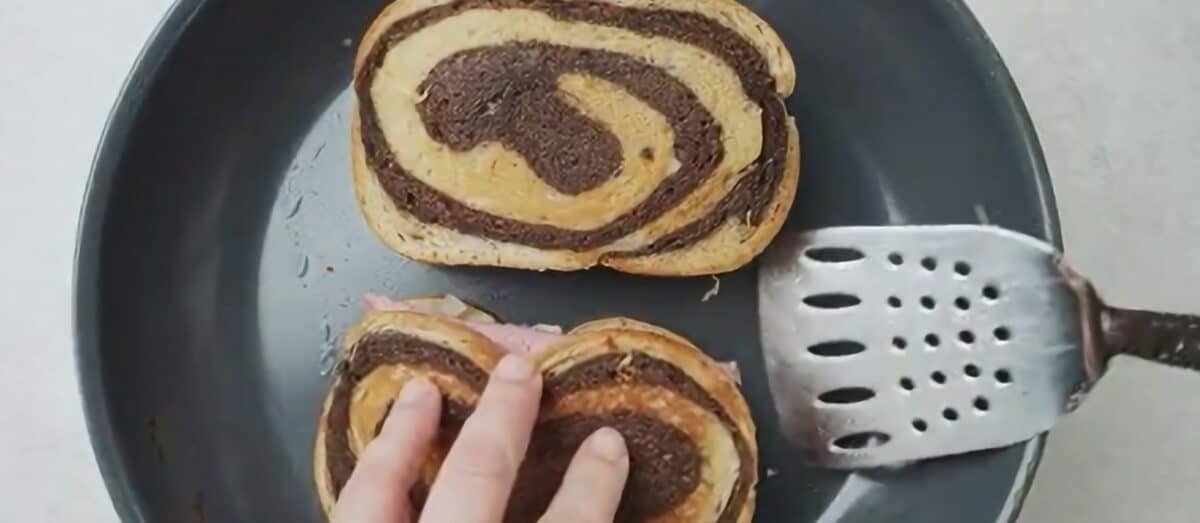 Toasting the sandwich in a skillet. 