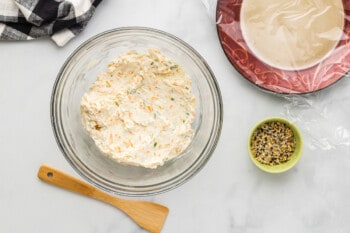 everything bagel cheeseball mixture in a glass bowl