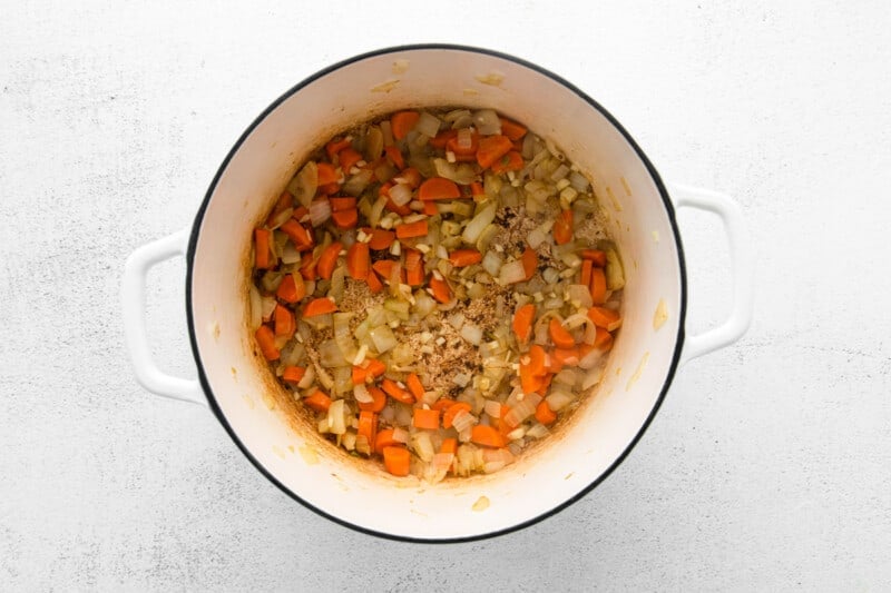 chopped carrots, onion, and garlic in a pot