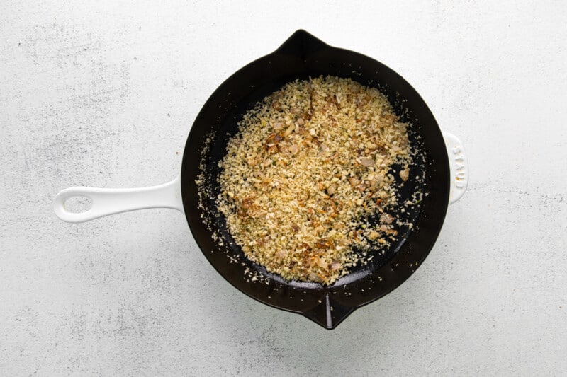 breadcrumb filling for stuffed pork loin in a skillet