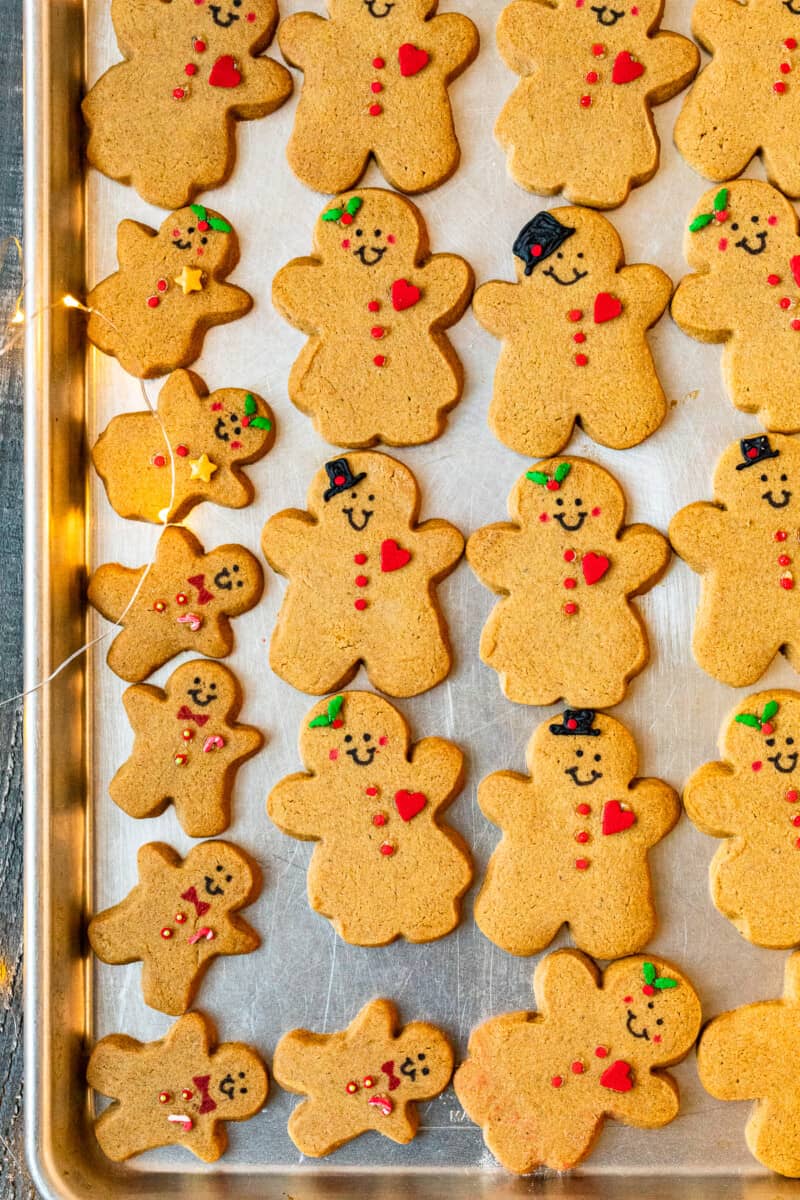 decorated gingerbread cookies on a baking sheet
