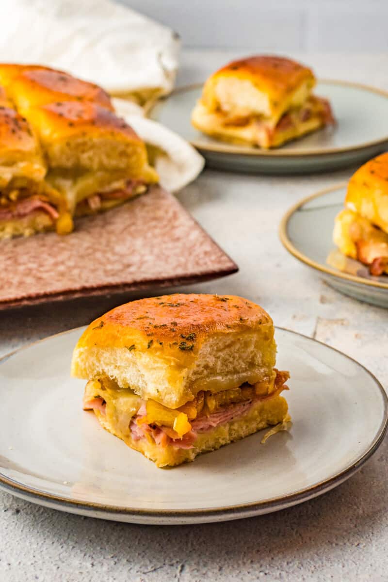 hawaiian ham and cheese slider on white plate