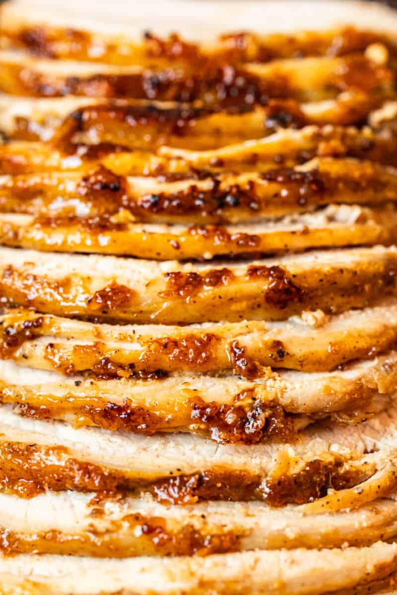 close up image of sliced honey baked pork tenderloin
