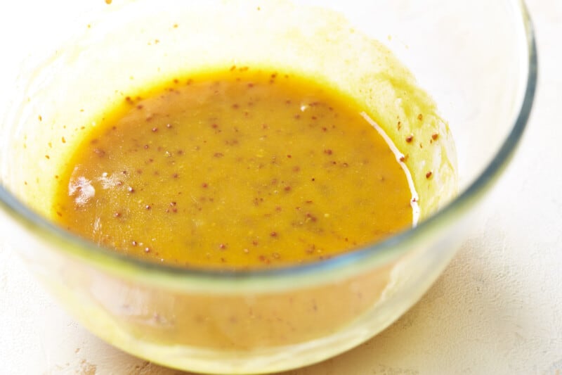 mustard sauce for baked pork tenderloin in a glass bowl.