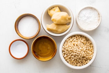 ingredients for pignoli cookies in bowls