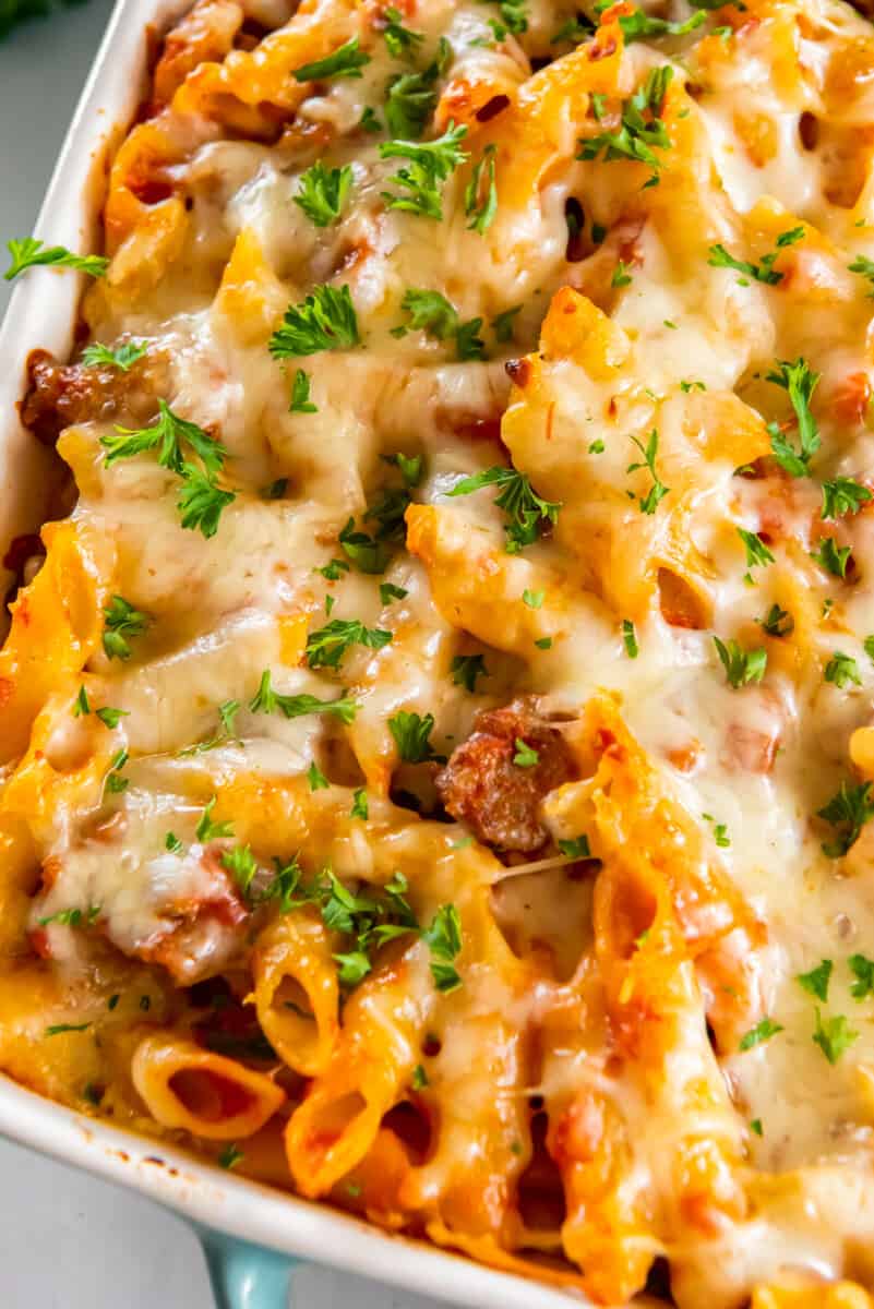 up close baked mostaccioli in casserole dish
