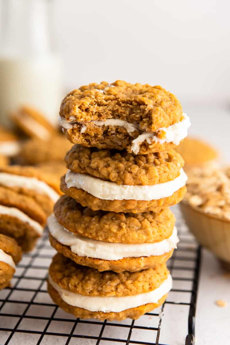 stack of 4 oatmeal cream pies with a bite taken from the top one