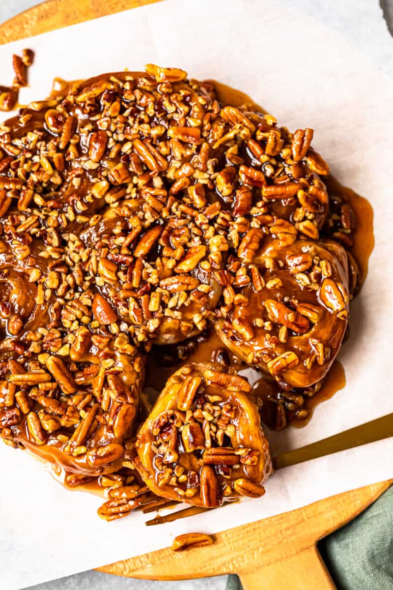 caramel pecan sticky buns on a white serving tray