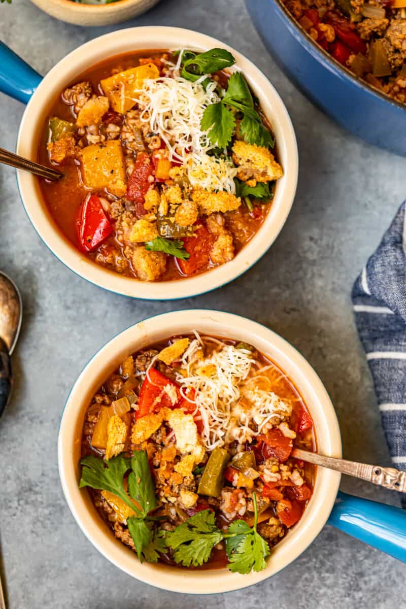 stuffed pepper soup in 2 bowls with spoons