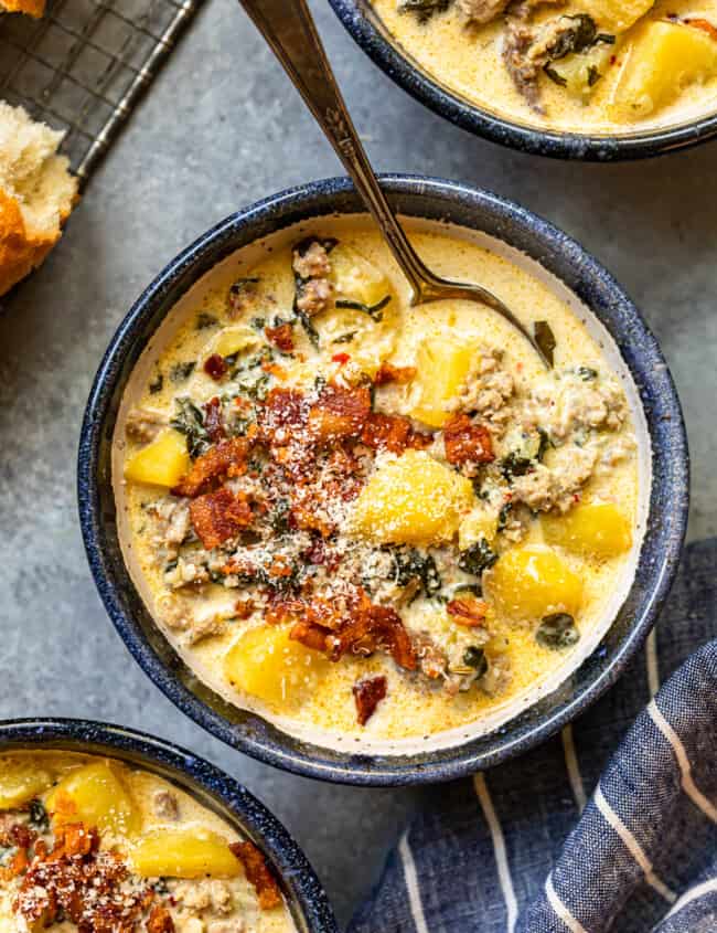 zuppa toscana soup in a bowl with a spoon