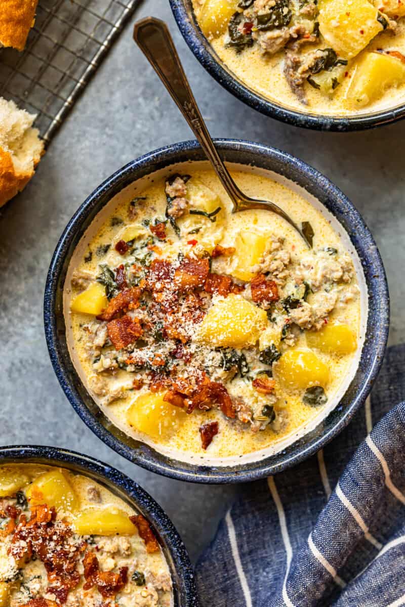 zuppa toscana soup in a bowl with a spoon