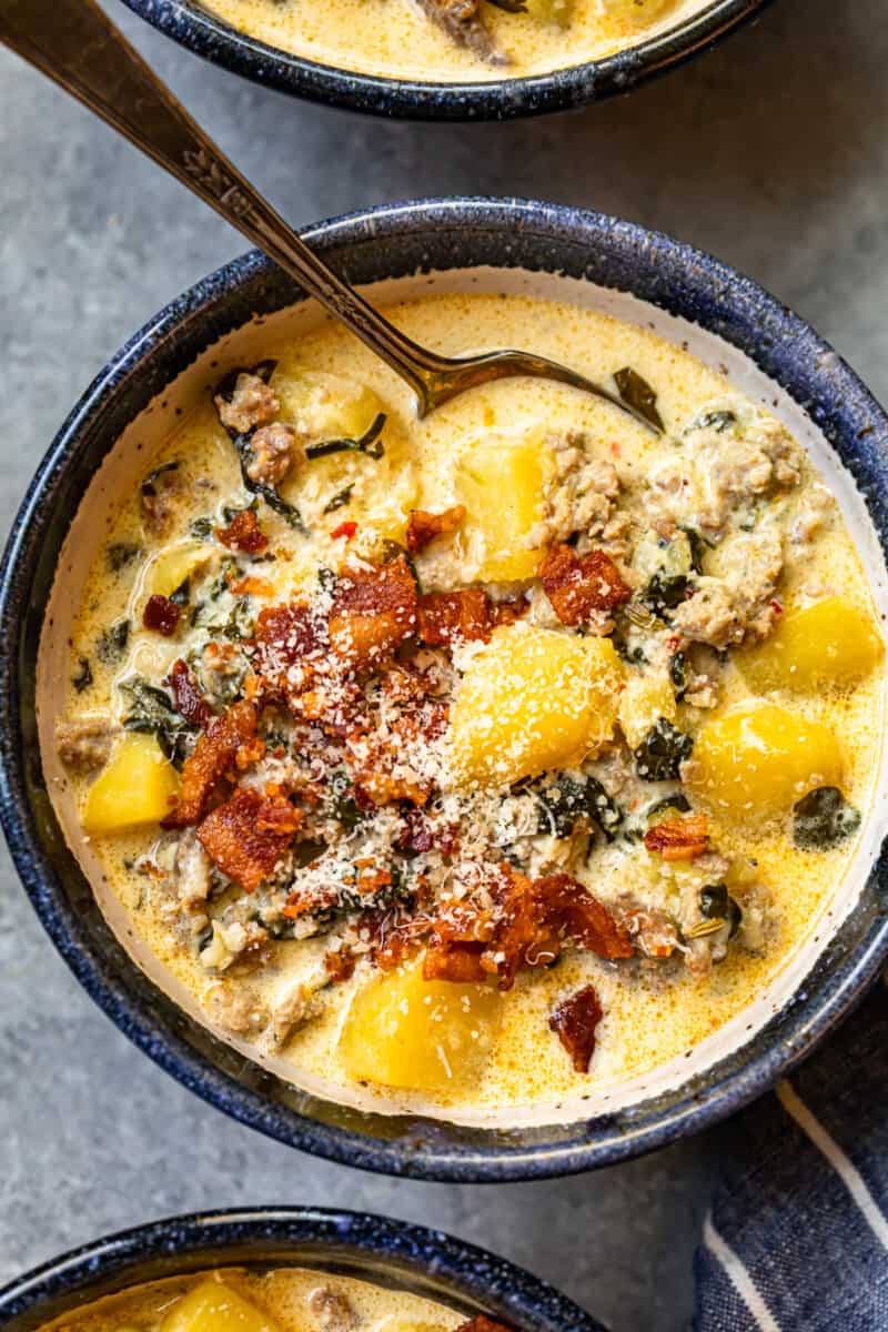 zuppa toscana soup in a bowl with a spoon