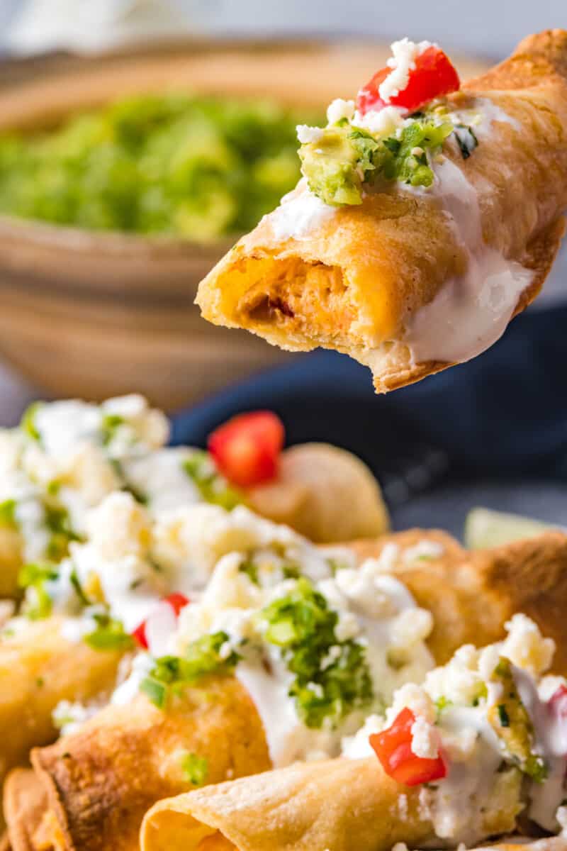 chicken taquito with a bite taken