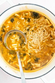 overhead view of easy ramen with a stainless steel ladle.