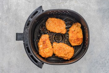 pork chops in an air fryer after cooking