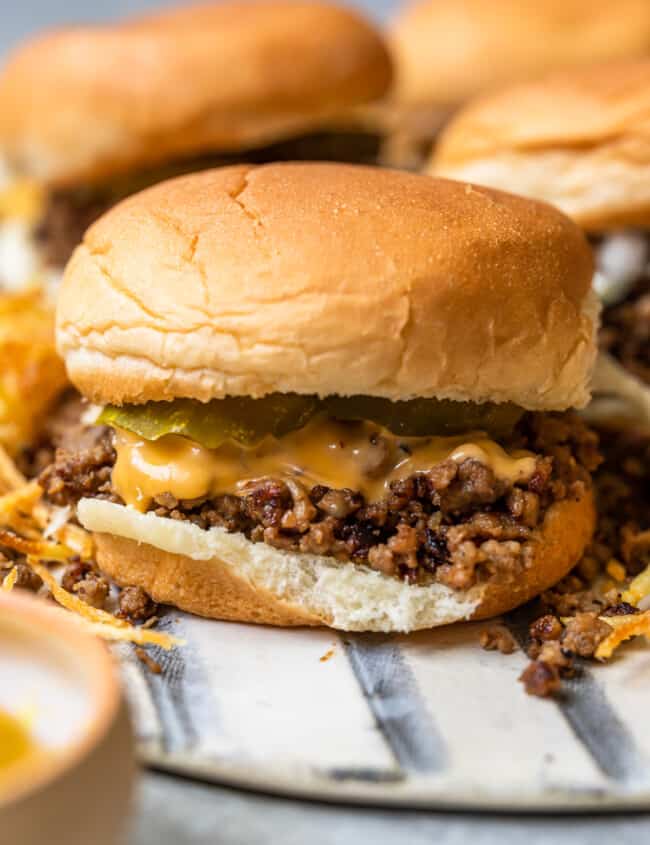 maid rite sandwiches topped with cheese and pickles