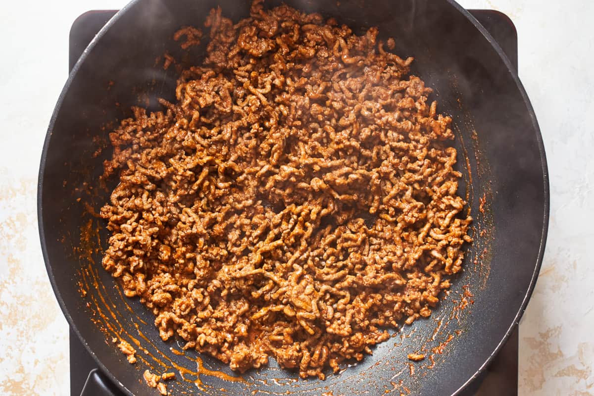 Seasoned ground beef in a skillet.  - 6