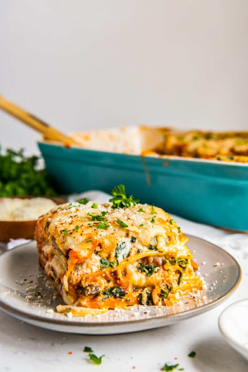 slice of vegetarian lasagna on a white plate