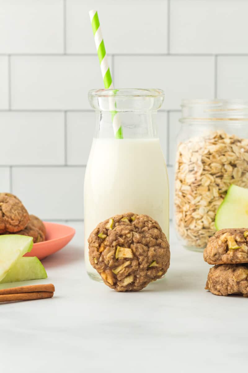 apple cinnamon breakfast cookies with a glass of milk