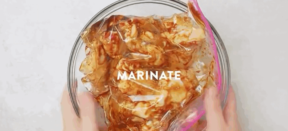 Marinating the chicken. 