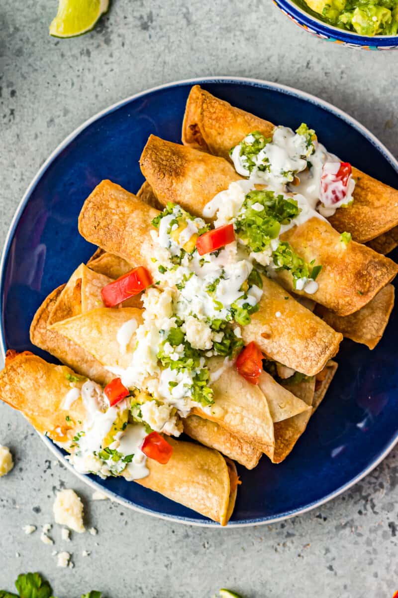 air fryer chicken taquitos on blue plate