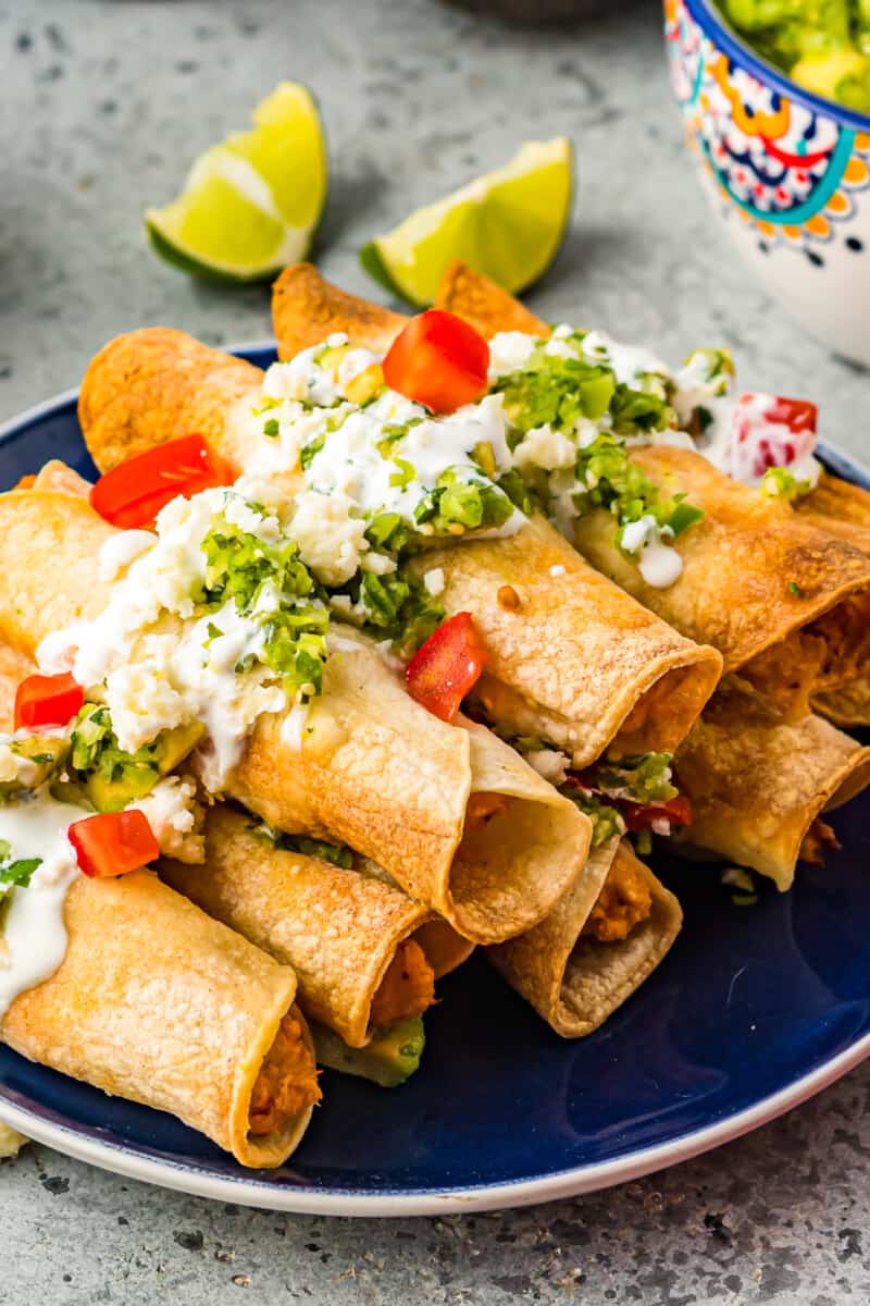 air fryer chicken taquitos on blue plate