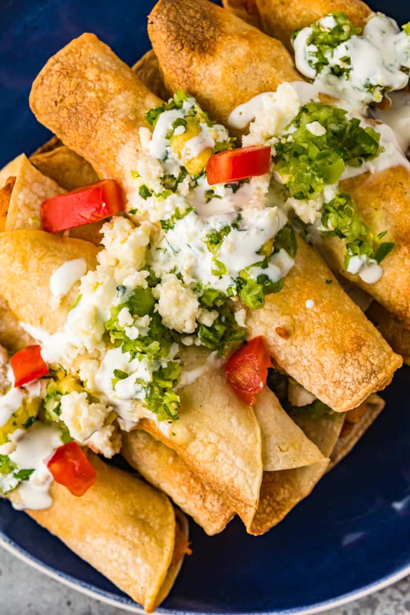 air fryer chicken taquitos on blue plate