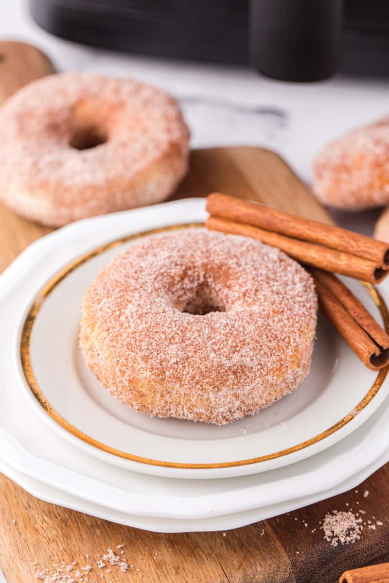 cinnamon sugar donut on a white plate