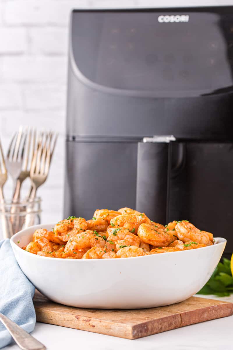 spicy shrimp in a white serving bowl